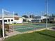 Well-maintained shuffleboard courts with benches nearby at 2601 Gulf N Dr # 427, Bradenton Beach, FL 34217