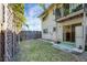 Small backyard with wooden fence and gate at 3101 Bee Ridge Rd # 118, Sarasota, FL 34239