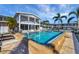 Community pool with surrounding lounge chairs and patio area at 3101 Bee Ridge Rd # 118, Sarasota, FL 34239