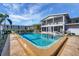 Community pool with surrounding lounge chairs at 3101 Bee Ridge Rd # 118, Sarasota, FL 34239