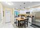 Modern kitchen with stainless steel appliances and an island at 3368 Ramblewood Pl # 37D1, Sarasota, FL 34237