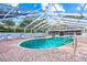 Screened-in pool and spa with brick paver deck provide a relaxing outdoor space and feature multiple lounge chairs at 3622 Bonaventure Ct, Sarasota, FL 34243