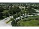 Aerial view of community entrance with lush landscaping at 4007 Overture Cir, Bradenton, FL 34209