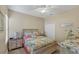 Bright bedroom with a coastal-themed bed and decor at 4007 Overture Cir, Bradenton, FL 34209