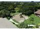 playground with play structures in a grassy area at 4007 Overture Cir, Bradenton, FL 34209