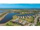 Aerial view of a single-Gathering home with pool, located in a waterfront community at 413 Wildlife Gln, Bradenton, FL 34209