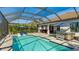 Spacious pool area with screened enclosure and spa at 413 Wildlife Gln, Bradenton, FL 34209