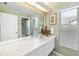 Clean bathroom with single sink vanity and shower/tub combo at 4901 Fallcrest Cir, Sarasota, FL 34233