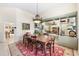 Elegant dining room with a large table and built-in hutch at 4901 Fallcrest Cir, Sarasota, FL 34233