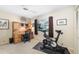 Home office space with desk, chair, and exercise bike at 4901 Fallcrest Cir, Sarasota, FL 34233