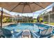 Enjoy the sun poolside with comfortable lounge chairs at 4901 Fallcrest Cir, Sarasota, FL 34233