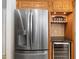 Stainless steel refrigerator with water dispenser and wine cooler at 4901 Fallcrest Cir, Sarasota, FL 34233