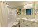 Clean bathroom featuring a walk-in shower and white vanity at 500 N Jefferson Ave # C3, Sarasota, FL 34237