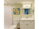 Updated bathroom with white vanity and shower/tub combo at 500 N Jefferson Ave # C3, Sarasota, FL 34237