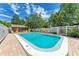 Community pool with plenty of lounge chairs for sunbathing at 500 N Jefferson Ave # C3, Sarasota, FL 34237