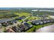 Stunning aerial view of the neighborhood showing waterfront properties and lake access at 508 Wildlife Gln, Bradenton, FL 34209