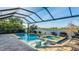 Stunning screened pool and spa offer water views, perfect for relaxation and outdoor entertaining at 508 Wildlife Gln, Bradenton, FL 34209