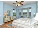 Bright bedroom with bay window, dresser, and king-size bed at 5150 Mahogany Run Ave, Sarasota, FL 34241