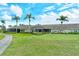 Back exterior view showing a screened patio area at 5150 Mahogany Run Ave, Sarasota, FL 34241