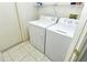 Laundry room with washer and dryer, and additional shelving at 5150 Mahogany Run Ave, Sarasota, FL 34241