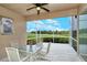 Peaceful screened patio overlooking a golf course view at 5150 Mahogany Run Ave, Sarasota, FL 34241