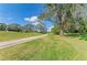 Beautiful view of a well-maintained golf course with mature trees and blue sky at 5304 96Th E St, Bradenton, FL 34211