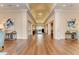 Lobby featuring wood floors, a vaulted ceiling, and decorative lighting with seating at 5304 96Th E St, Bradenton, FL 34211