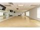 Bright yoga studio with wood floors, fitness ball storage and mirrored wall at 5304 96Th E St, Bradenton, FL 34211