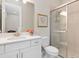 Clean bathroom with a single sink vanity and a glass shower enclosure at 5361 Salcano St, Sarasota, FL 34238