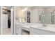 Double vanity bathroom with a large walk in shower and separate closet at 5361 Salcano St, Sarasota, FL 34238