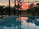 Tranquil pool at sunset, screened enclosure at 5361 Salcano St, Sarasota, FL 34238