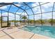 Relaxing pool and lanai with spa and lake view at 5361 Salcano St, Sarasota, FL 34238