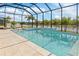 Inviting pool and spa with screened enclosure at 5361 Salcano St, Sarasota, FL 34238