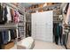 Large walk-in closet with ample shelving, drawers, and hanging space at 5361 Salcano St, Sarasota, FL 34238