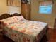 Cozy bedroom with a seashell-themed bedspread and built-in storage at 6067 Arlene Way, Bradenton, FL 34207