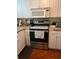 Cozy kitchen with wood countertops and stainless steel appliances at 6067 Arlene Way, Bradenton, FL 34207