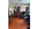 Living room with hardwood floors and brown furniture at 6067 Arlene Way, Bradenton, FL 34207