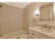 Updated bathroom with new vanity and shower at 6947 Woodwind Dr # 77, Sarasota, FL 34231