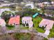 An aerial view showcasing the property's setting within a residential community at 7724 Us Open Loop, Lakewood Ranch, FL 34202