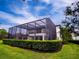 Large screened pool cage encompassing the backyard at 7724 Us Open Loop, Lakewood Ranch, FL 34202