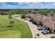 Aerial view of the golf course and country club, showcasing the well-manicured grounds at 8403 Grand Estuary Trl # 301, Bradenton, FL 34212