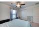 Bedroom with a full-size bed and ceiling fan at 8547 40Th E Cir, Palmetto, FL 34221