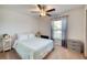 Bedroom with a full bed, window, and ceiling fan at 8547 40Th E Cir, Palmetto, FL 34221