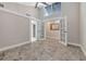 Bright bedroom with tile floors and french doors at 9 Sandy Cove Rd # 8A, Sarasota, FL 34242