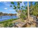 Waterfront patio with seating and lake view at 9 Sandy Cove Rd # 8A, Sarasota, FL 34242