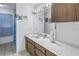 Clean bathroom with double vanity and ample counter space at 1006 Pine Forest Ct, Venice, FL 34293