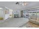 Living room with sliding doors leading to a relaxing outdoor patio area at 1006 Pine Forest Ct, Venice, FL 34293