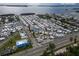 Aerial view of community with pool and many mobile homes at 10315 Cortez W Rd # 59-3, Bradenton, FL 34210