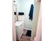 Clean bathroom with white vanity and teal accents at 10315 Cortez W Rd # 59-3, Bradenton, FL 34210