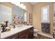 Bathroom boasts a large vanity and a shower/tub combo at 12822 Rainwashed Loop, Parrish, FL 34219